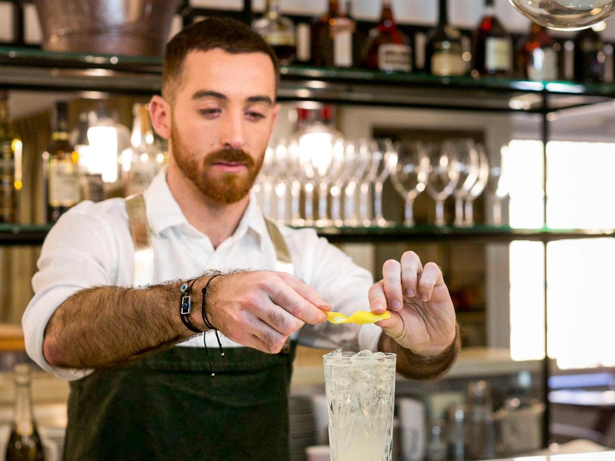 The Sebel Quay West Suites Sydney Eksteriør billede A bartender at work